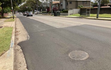 EziPit DI frame and cover installed on a main road as part of the EziPit 1000 Maintenance Hole sewerage project in NSW.