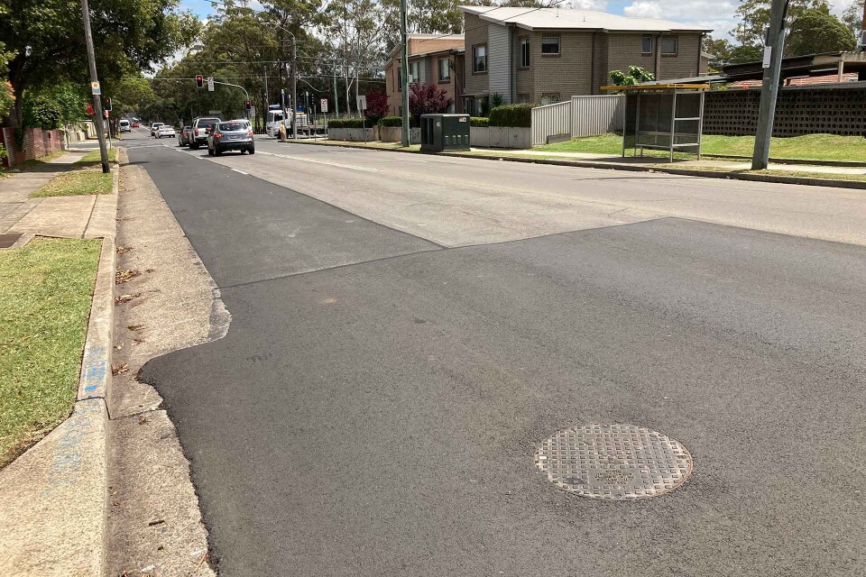 EziPit DI frame and cover installed on a main road as part of the EziPit 1000 Maintenance Hole sewerage project in NSW.